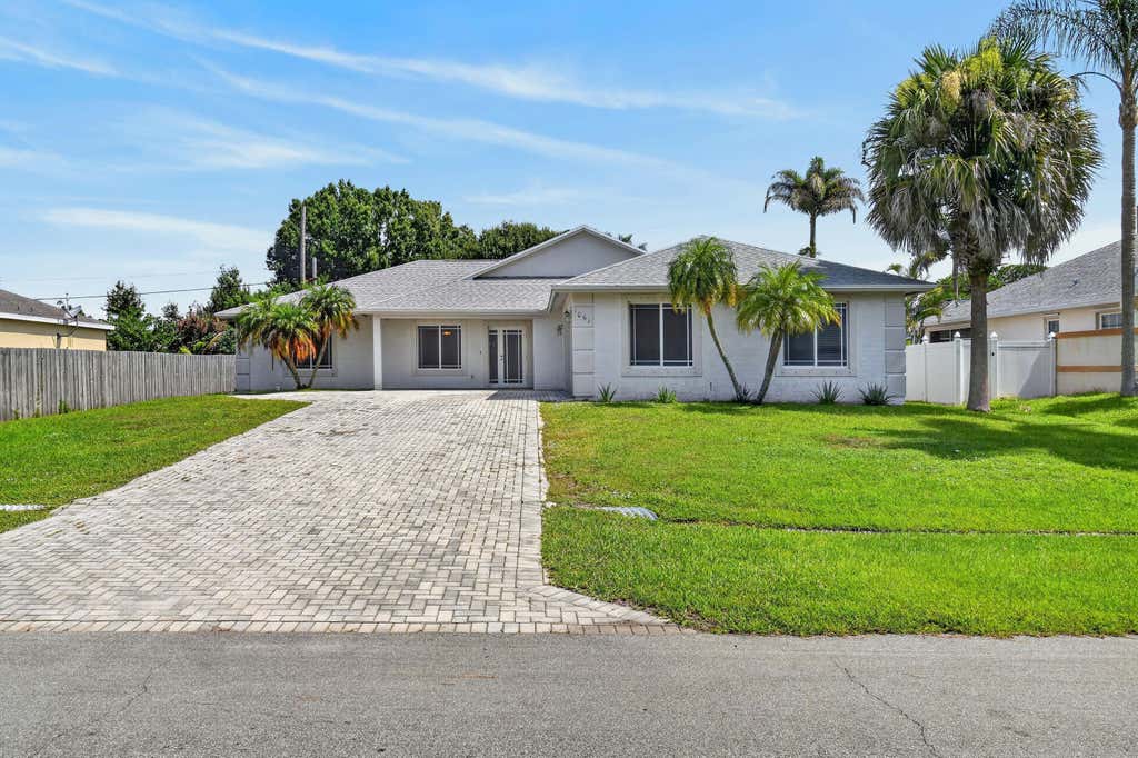 Photo of 1061 SW BENSCHOP Avenue, Port Saint Lucie, FL 34953 (MLS # B26057585)