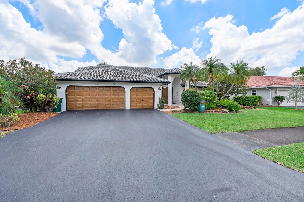 Photo of 5431 NW 109th Lane, Coral Springs, FL 33076 (MLS # B26030386)