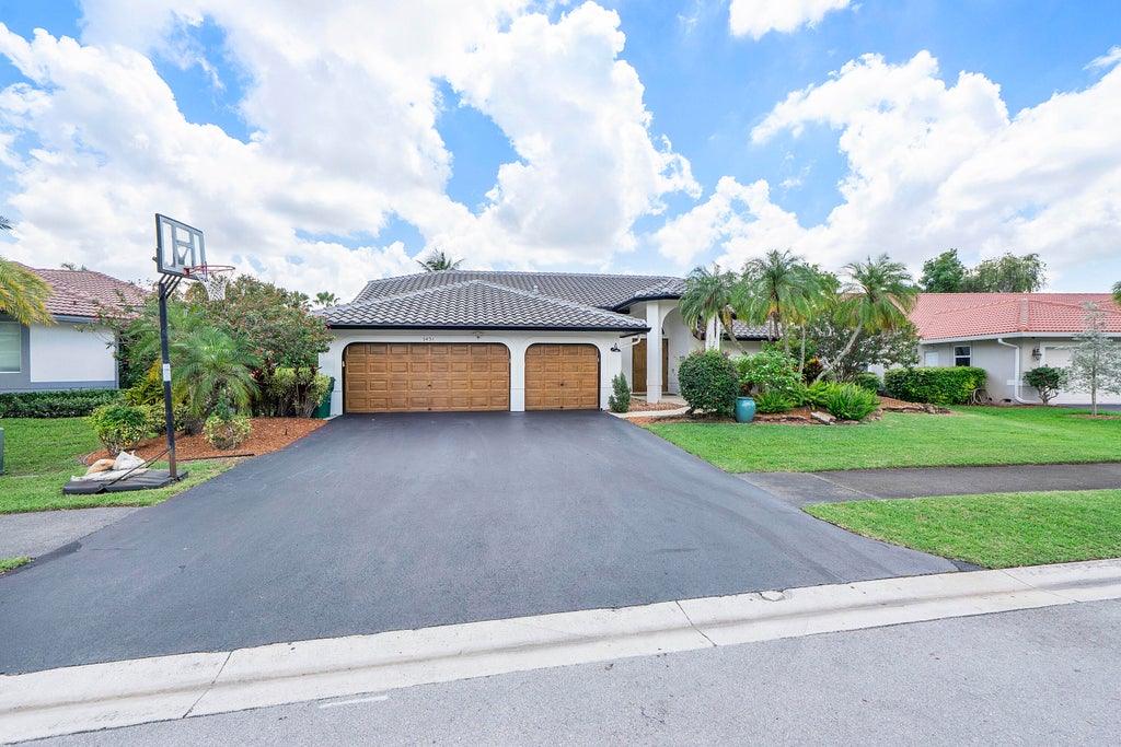Photo of 5431 NW 109th Lane, Coral Springs, FL 33076 (MLS # B26030386)