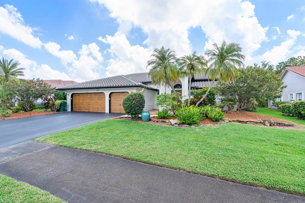 Photo of 5431 NW 109th Lane, Coral Springs, FL 33076 (MLS # B26030386)