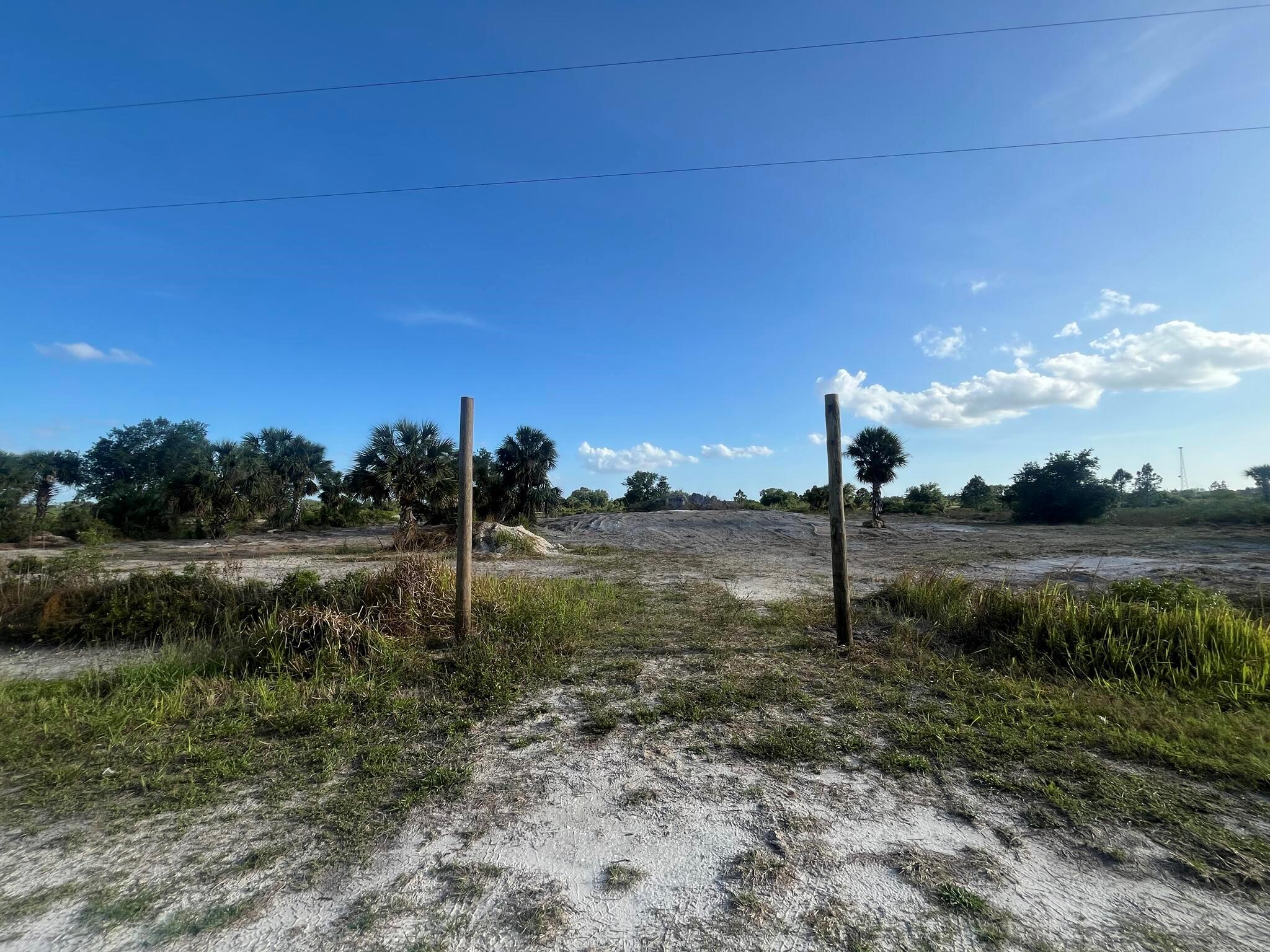 Build or bring Your Dream Home! Bring your vision to life on this spacious 1.25-acre cleared lot, already prepared for construction with a house pad, retention pond, and culvert in place. The seller has invested over $18,000 in fill, and a current survey is available, saving you time and money. Conveniently located not far off the paved road, the property offers the perfect balance of accessibility and privacy. Enjoy the tranquility of a rural lifestyle while still being close to essential amenities. Outdoor enthusiasts will appreciate nearby attractions such as Kissimmee River Preserve State Park and Lake Okeechobee, renowned for its world-class fishing. Whether your passion is fishing, hunting, agriculture, or simply enjoying wide-open space, this property provides the ideal setting to