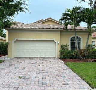 Photo of 6211 Arlington Way, Fort Pierce, FL 34951 (MLS # B26049393)