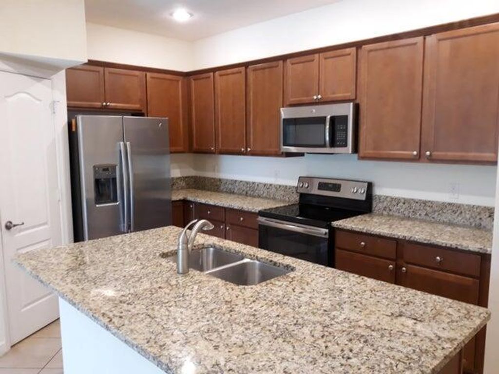 Photo of 9673 SW Purple Martin Way, Stuart, FL 34997 (MLS # R11055620)