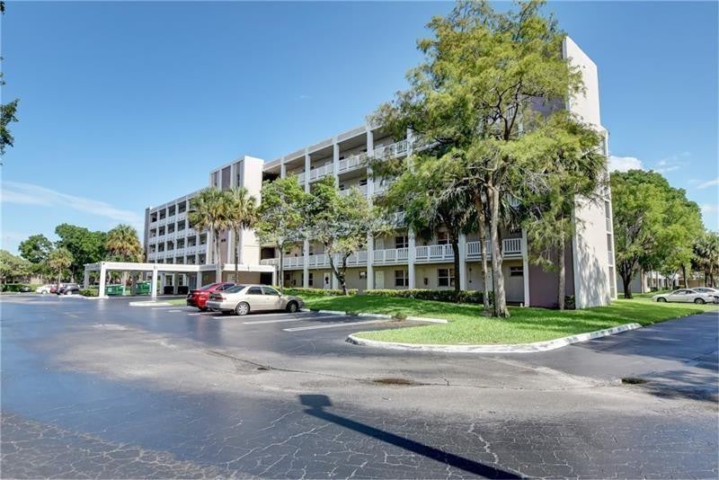 Photo of 8735 Ramblewood Drive #212, Coral Springs, FL 33071 (MLS # B26089559)