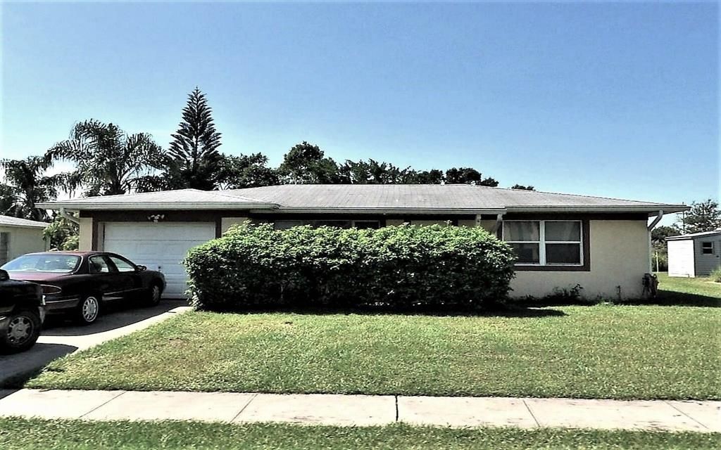 Photo of 132 NE Solida Drive, Port Saint Lucie, FL 34983 (MLS # R10773083)