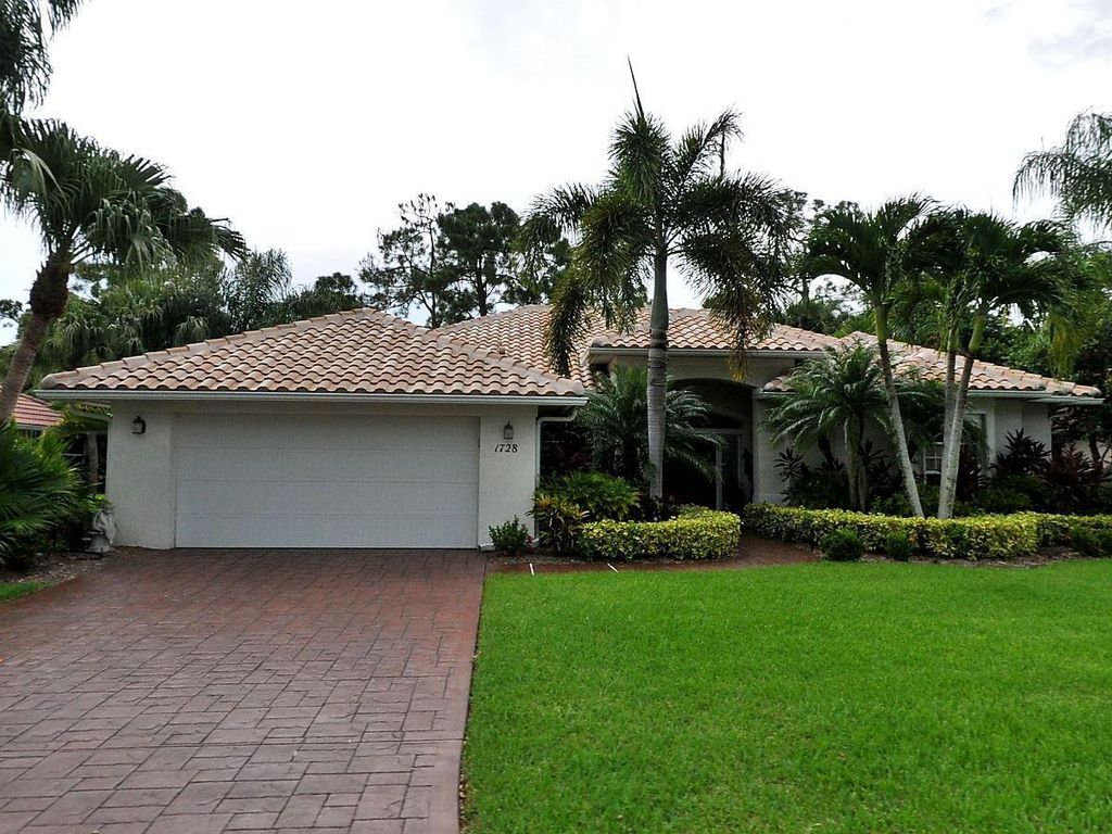 Photo of 1728 SW Mockingbird Drive, Saint Lucie West, FL 34986 (MLS # R10801142)