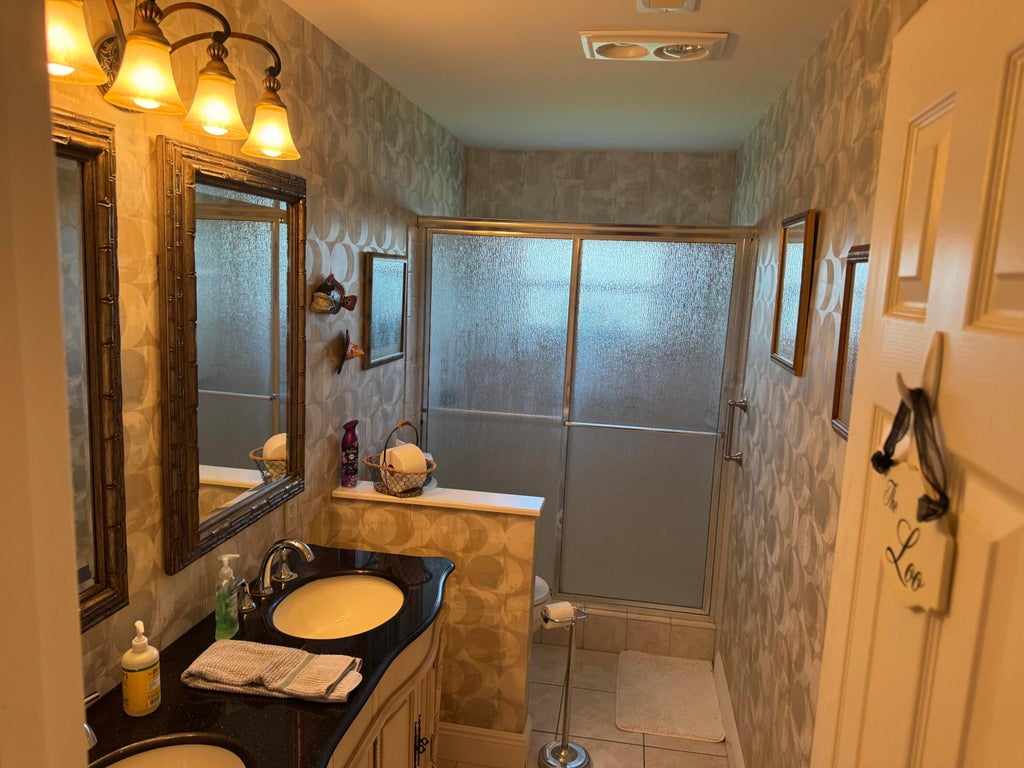 Photo of 10548 GREENTRAIL Drive S, Boynton Beach, FL 33436 (MLS # B26077836)