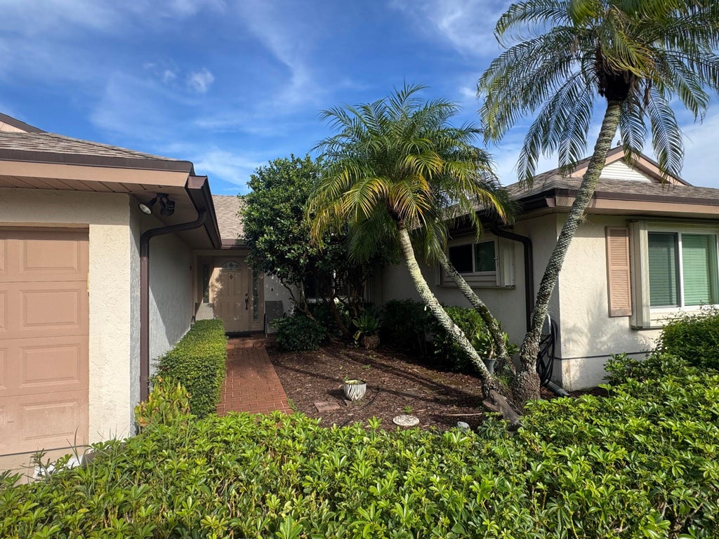 Photo of 10548 GREENTRAIL Drive S, Boynton Beach, FL 33436 (MLS # B26077836)
