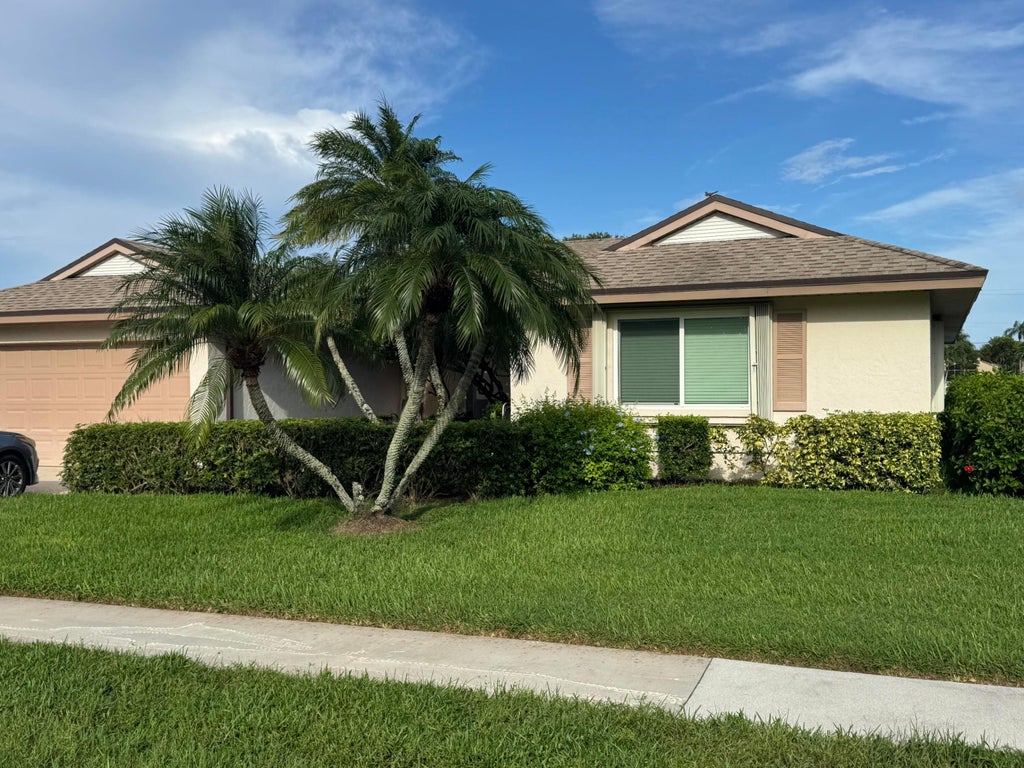 Photo of 10548 GREENTRAIL Drive S, Boynton Beach, FL 33436 (MLS # B26077836)
