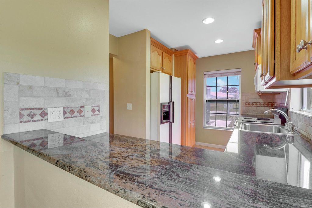 Photo of 1441 SE Larkwood Circle, Port Saint Lucie, FL 34952 (MLS # R10956252)