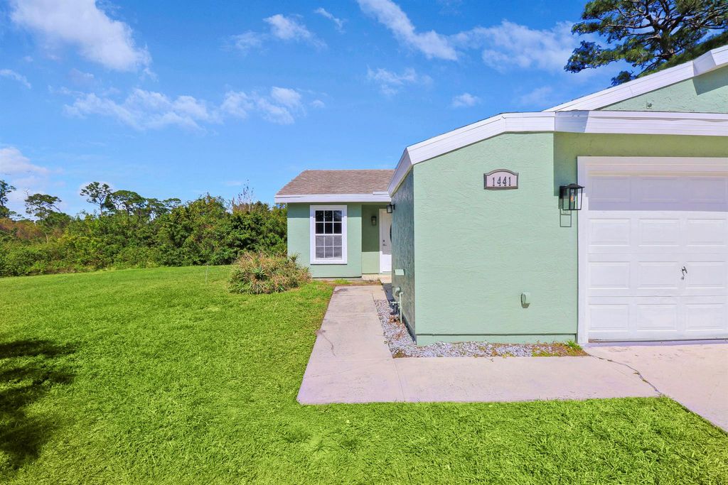 Photo of 1441 SE Larkwood Circle, Port Saint Lucie, FL 34952 (MLS # R10956252)