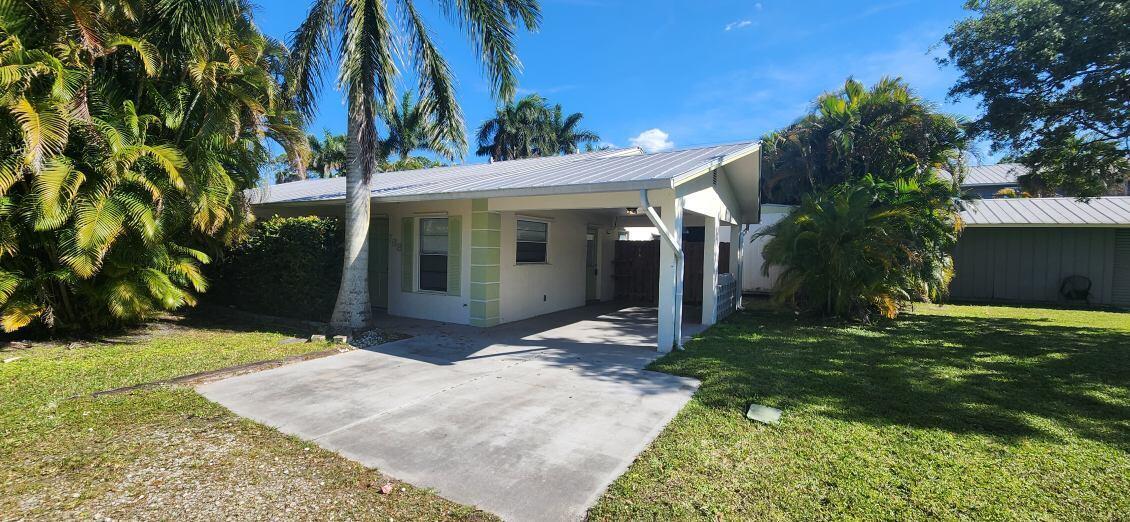 Hurry and take a look at this half duplex, 2 bedroom 1 bath, conveniently located near Veterans Memorial Bridge in Palm City!!! Competitively priced, it won't last long! Great Schools! Beach, shopping, restaurants, all right around the corner! The property is vacant and ready for you to move into IMMEDIATELY!