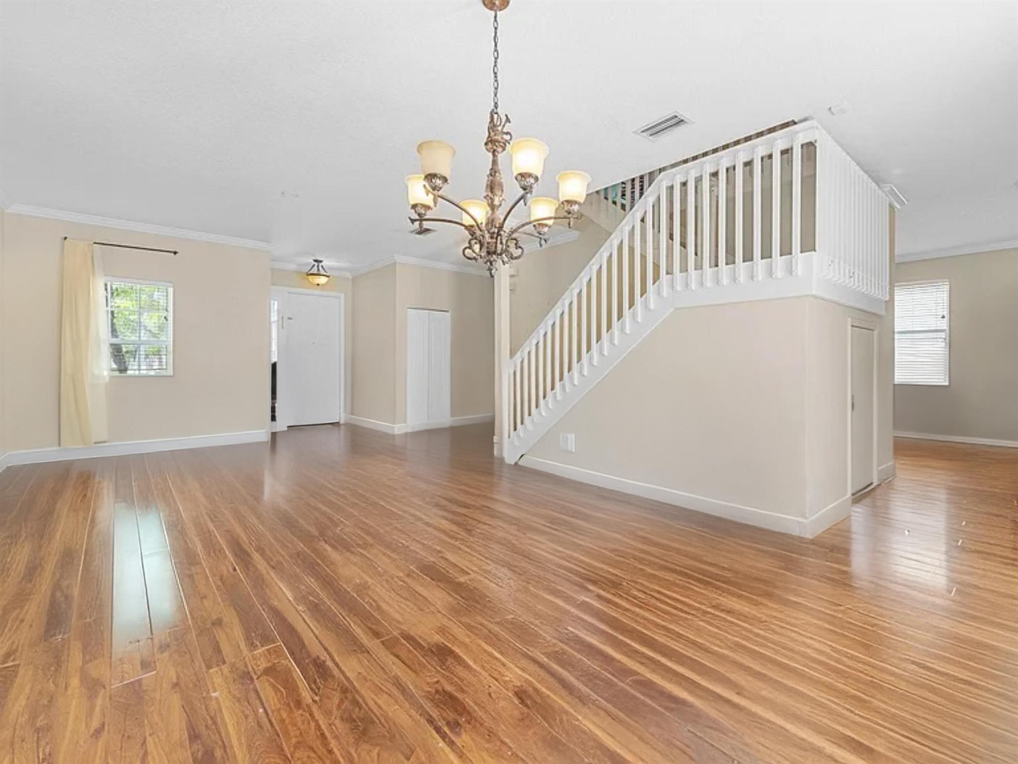 Welcome to this beautiful two-story single-family home located in the highly desirable, gated community of Victoria Grove in Royal Palm Beach. This 4-bedroom, 2.5-bathroom home features a spacious layout with newer laminate wood-look flooring downstairs. The kitchen updated only a few years ago, boasts newer countertops and cabinetry, as well as stainless steel appliances. Additional highlights include a 2024 A/C system, 2019 water heater, under-the-stairs storage, and a generous upstairs primary suite with a large walk-in closet. Three additional upstairs bedrooms offer ample space and great closet storage. The home also includes a two-car garage with an oversized four-car driveway.