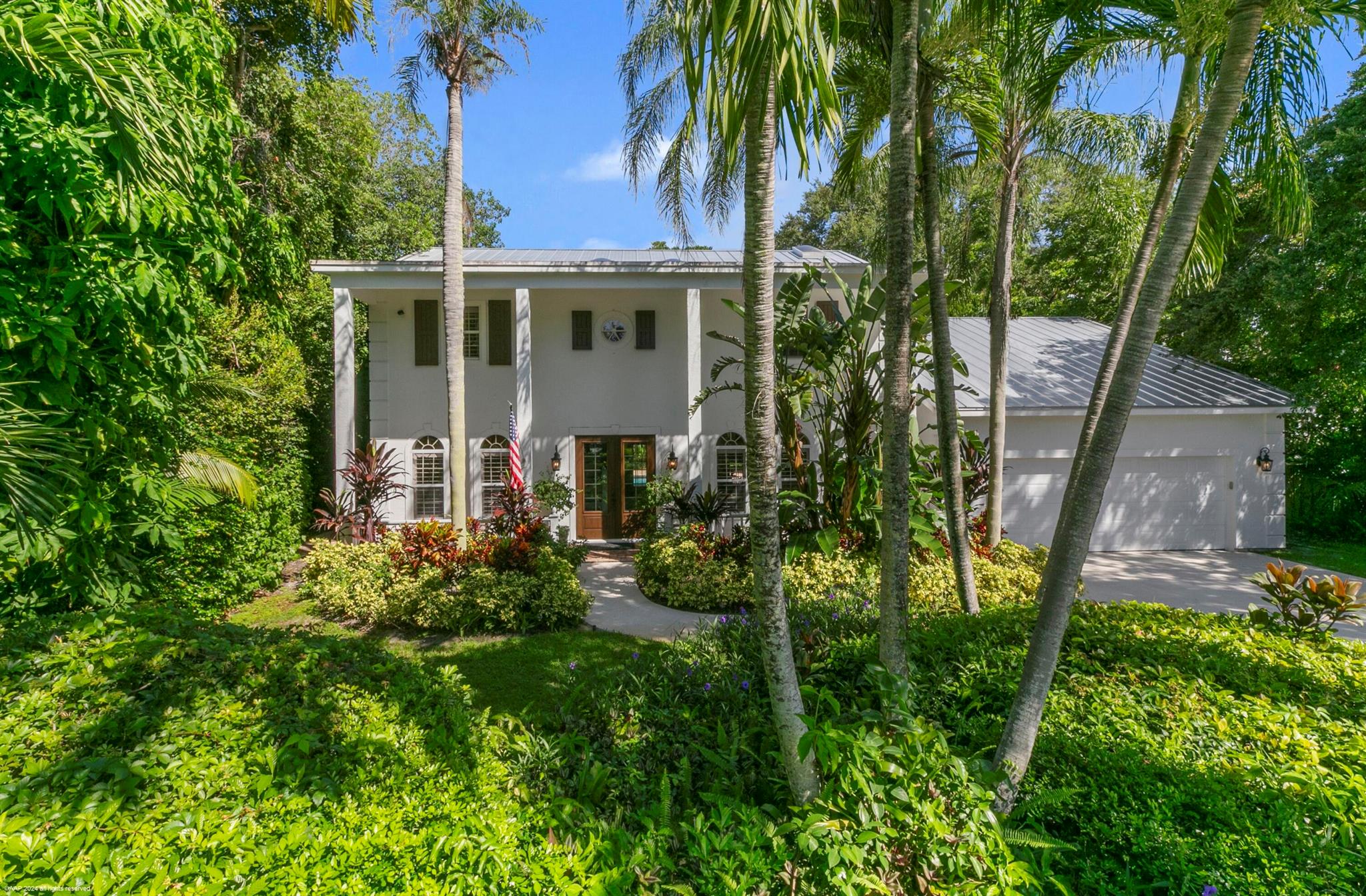 Coastal elegance meets everyday comfort in South Sewall's Point! Fall in love with this model-perfect coastal retreat rental tucked away on a quiet street where charm, community, & quality converge. Set on high elevation, this home is surrounded by lush tropical landscaping & offers a private fenced backyard oasis perfect for entertaining. The ultimate perfect family home with room for everyone-5 bed, 5 bath, & just under 4000sqft! The gourmet kitchen is a chef's dream, thoughtfully designed with a Sub-Zero refrigerator, Wolf gas range, steam oven, two dishwashers, and a butler's pantry, ideal for effortless entertaining and everyday living. With designer finishes and an effortless blend of comfort and sophistication, every detail was curated with care.