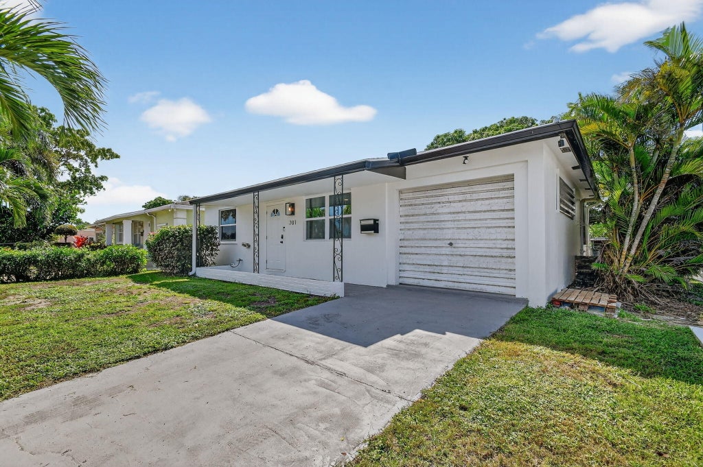 Photo of 701 S D Street, Lake Worth Beach, FL 33460 (MLS # R11128887)