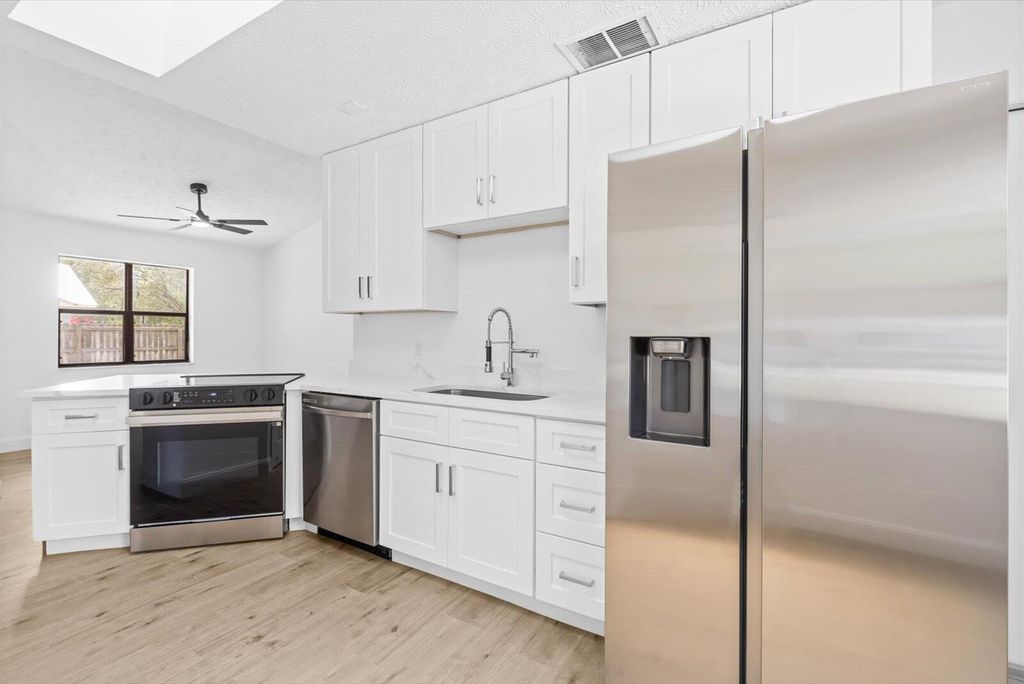 Photo of 104 Germani Drive, Fort Pierce, FL 34982 (MLS # R11083468)