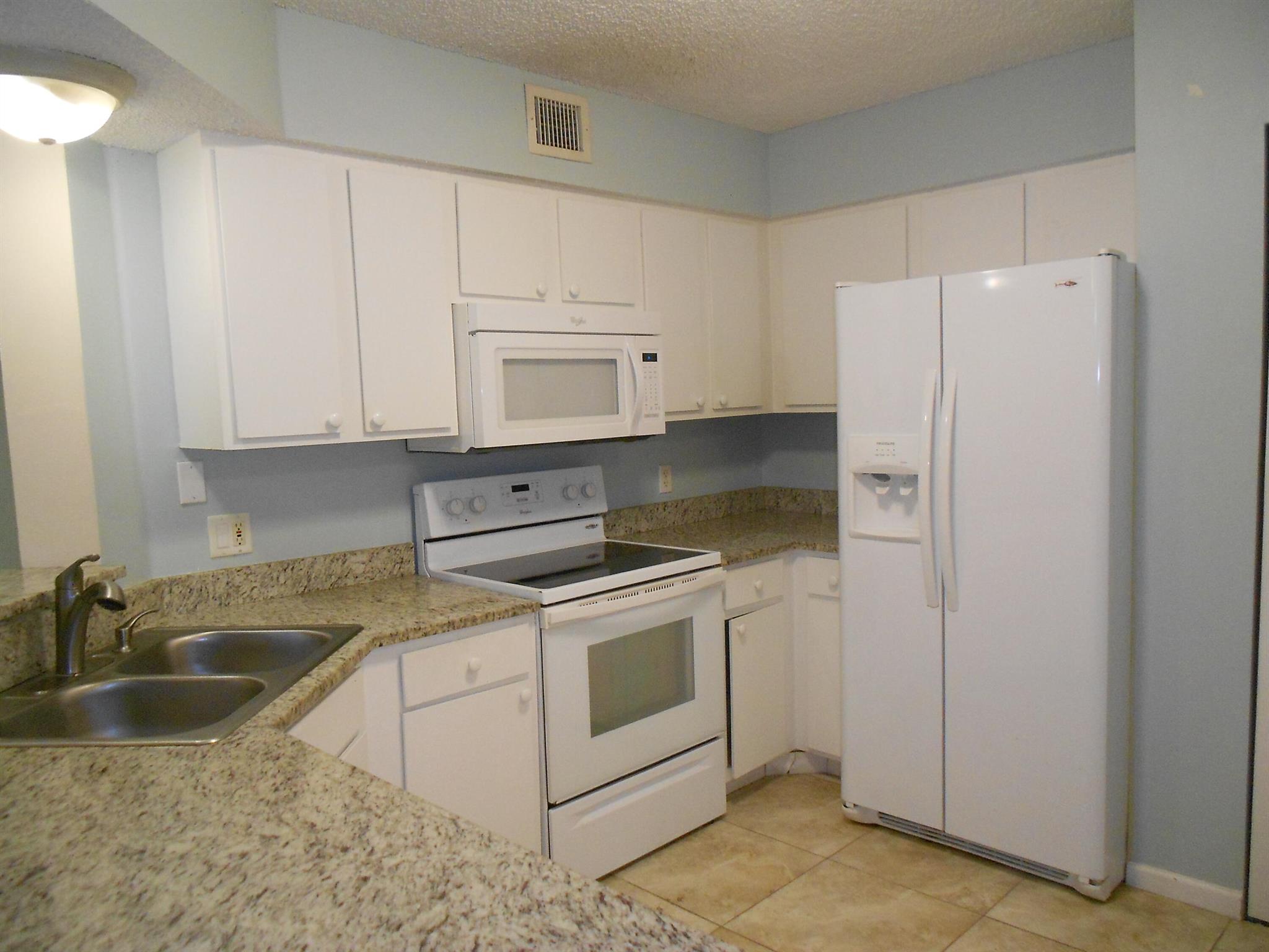Annual Rental. 3 bed/2 bath/1 detached garage. 2nd floor walk up features an open kitchen with granite counters Custom open gourmet kitchen is outfitted with granite counters. Tiled flooring throughout. the Master Bath en-Suite includes a large walk in closet. The second bedroom with w/in closet and bath can be made private by closing the pocket door . Enjoy the the privacy from the covered balcony. Freshly painted Mariners Cay is an all age community with resort style amenities which include Intracoastal pool, pavilion, clubhouse, private white sand beach, spa, sauna, exercise room, billiards, grill areas, nature preserve and dog park. Live the dream in this gated Intracoastal community
