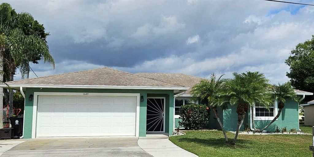 Photo of 1649 SE Dome Circle, Port St Lucie, FL 34952 (MLS # R10876543)