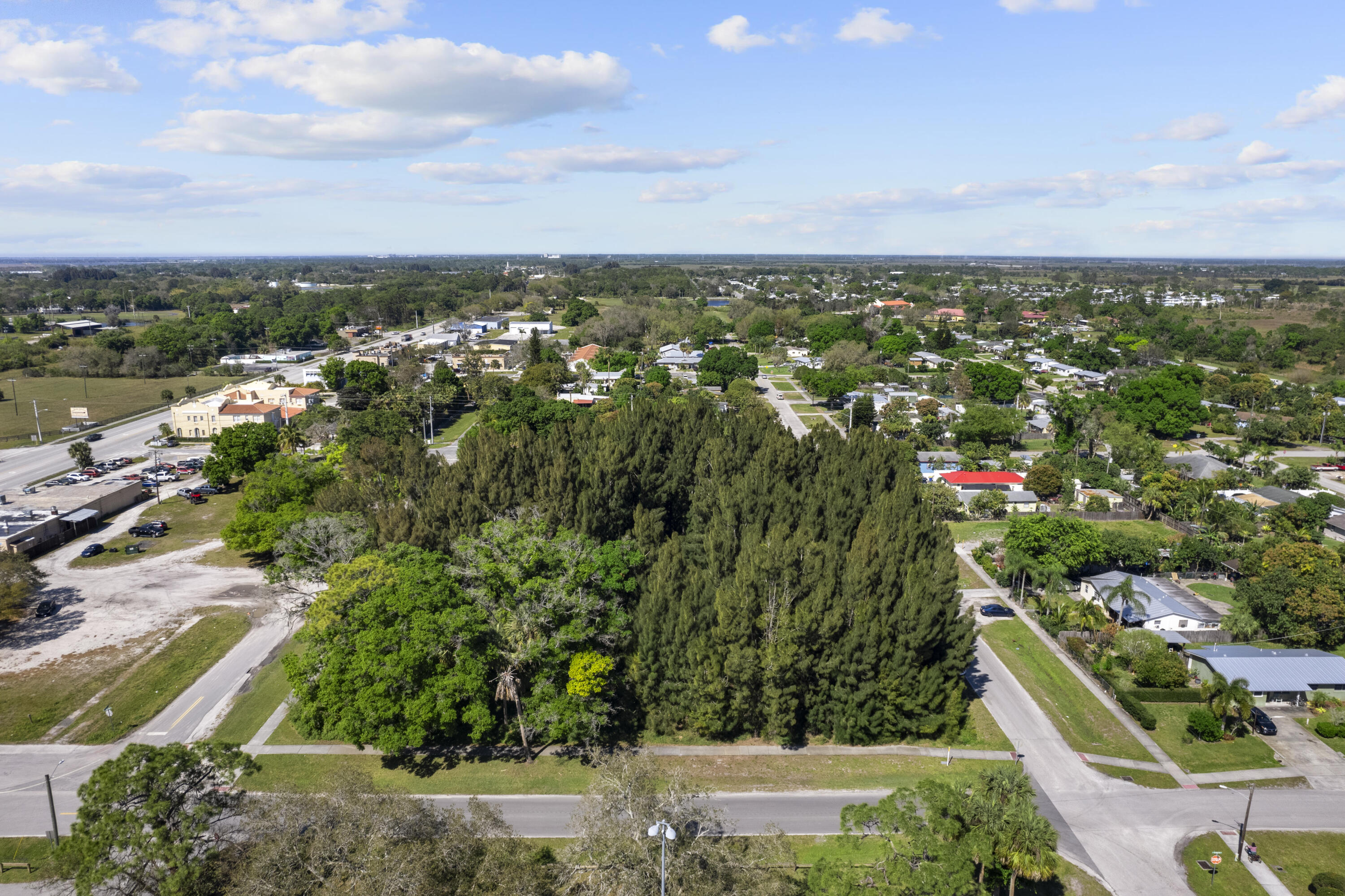 Prime 33,310 sq. ft. commercial lot in the heart of Indiantown, FL, zoned B-1, offering a wealth of business opportunities. With paved road access and a lush cypress-lined backdrop, this versatile property is ideal for development in Martin County's growing commercial sector.The B-1 zoning supports a variety of permitted uses, including professional offices, personal services, retail establishments under 15,000 sq. ft., restaurants, medical offices, financial institutions, and more, making it a prime location for entrepreneurs and investors. With the area's continued expansion and business-friendly environment, this lot is perfect for a new venture or expansion.Seize this exceptional investment opportunity in a high-potential market!