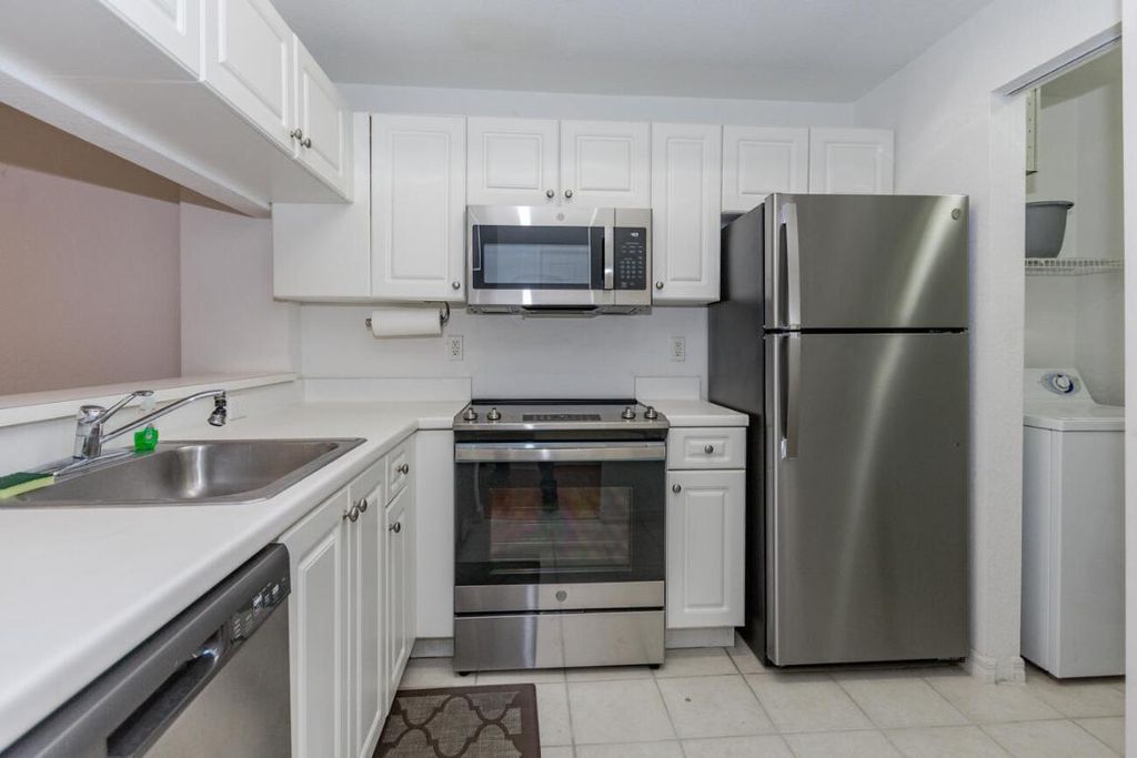 Photo of 2810 Grande Parkway #104, Palm Beach Gardens, FL 33410 (MLS # R10931616)