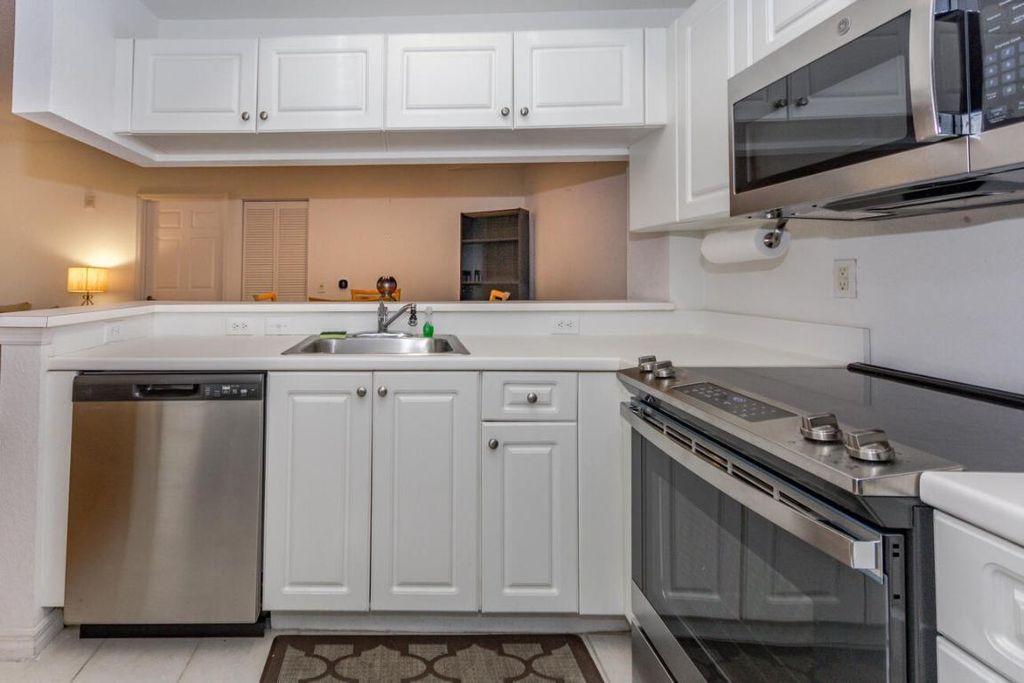 Photo of 2810 Grande Parkway #104, Palm Beach Gardens, FL 33410 (MLS # R10931616)