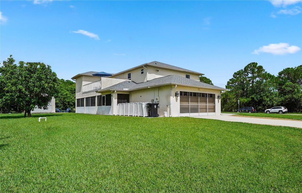 Photo of 5901 NW Wolverine Road, Port Saint Lucie, FL 34986 (MLS # F10527863)