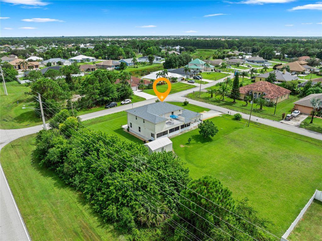 Photo of 5901 NW Wolverine Road, Port Saint Lucie, FL 34986 (MLS # F10527863)