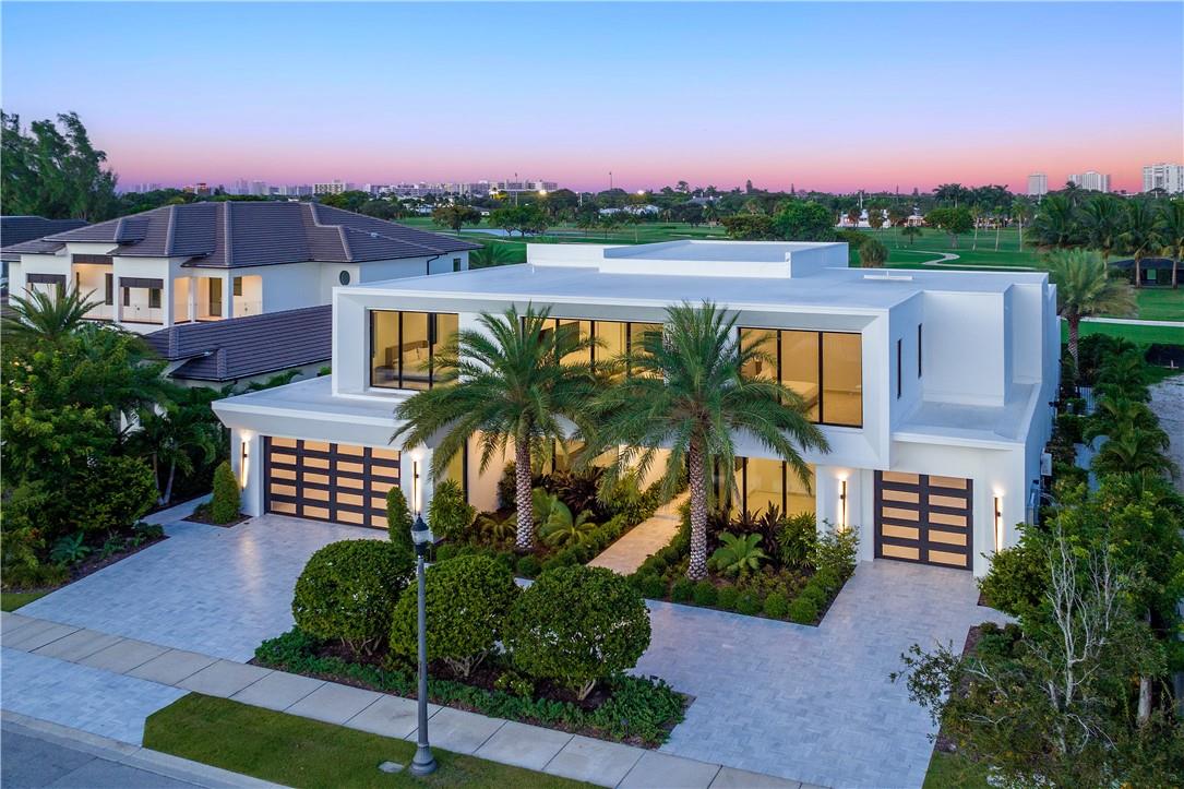 Breathtaking, Modern and Elegant, New Construction Estate in the Gated Golfing Community, The Enclave of Coral Ridge Country Club. This home, designed by Architect Bruce Celinsky, boasts 7,490 SF of living space and sits on an oversized 17,000 sqft lot with stunning direct golf course views. Inside you will find soaring 24' ceilings, chef's kitchen with double islands, prep kitchen & pantry, main floor primary suite, 2 indoor fireplaces, upstairs media room with full kitchen, 7 car air conditioned & porcelain tiled garages, outdoor kitchen and custom pool & spa with fire & water features. This fully equipped smart home also comes with Sonos for Music, Lutron Lighting and Aqualink for the pool and spa. Home offered fully furnished with luxury Artefacto furniture.