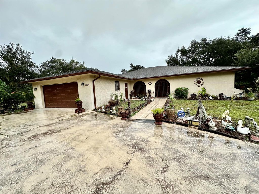 Photo of 2408 N 49th Street, Fort Pierce, FL 34946 (MLS # R10937630)