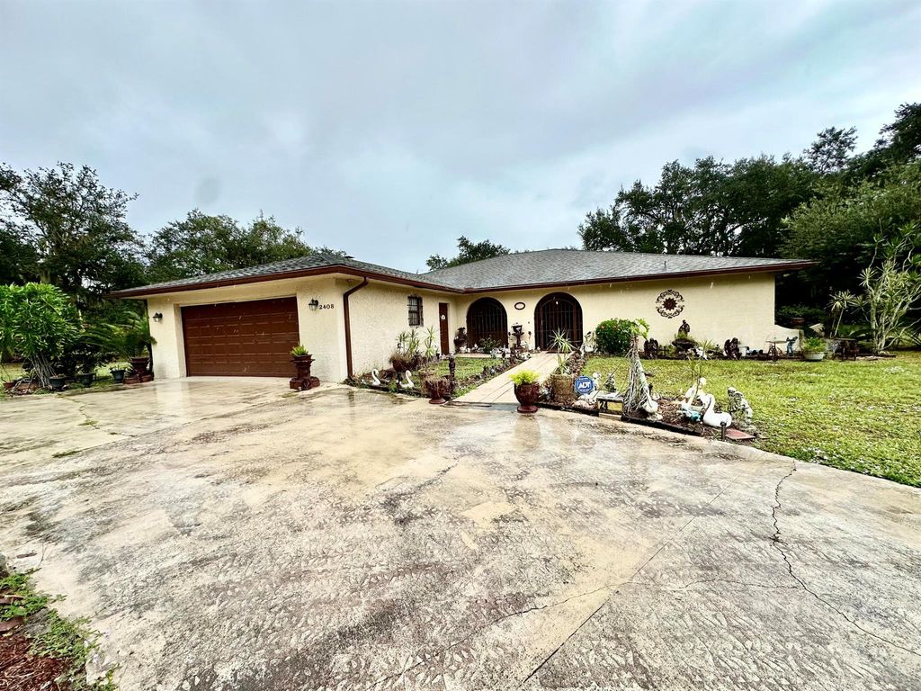 Photo of 2408 N 49th Street, Fort Pierce, FL 34946 (MLS # R10937630)