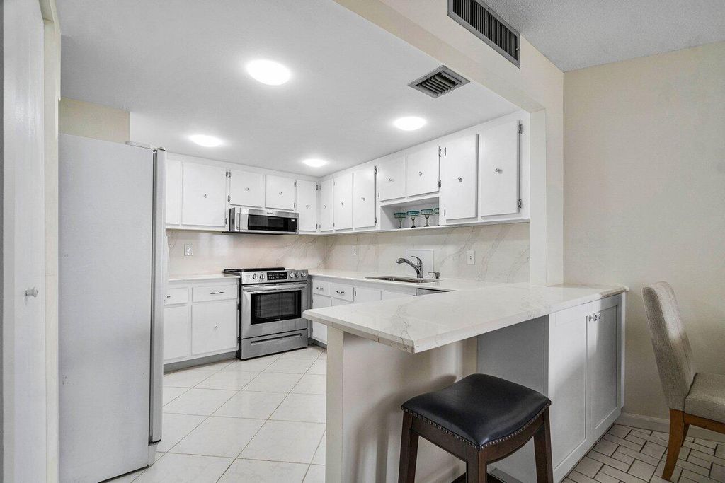 Photo of 2800 N Ocean Drive #B-12d, Singer Island, FL 33404 (MLS # R10996232)