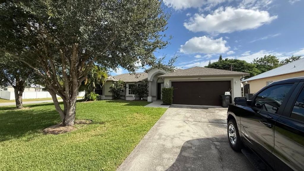 Photo of 2455 SW Savage Boulevard, Port Saint Lucie, FL 34953 (MLS # R11140198)