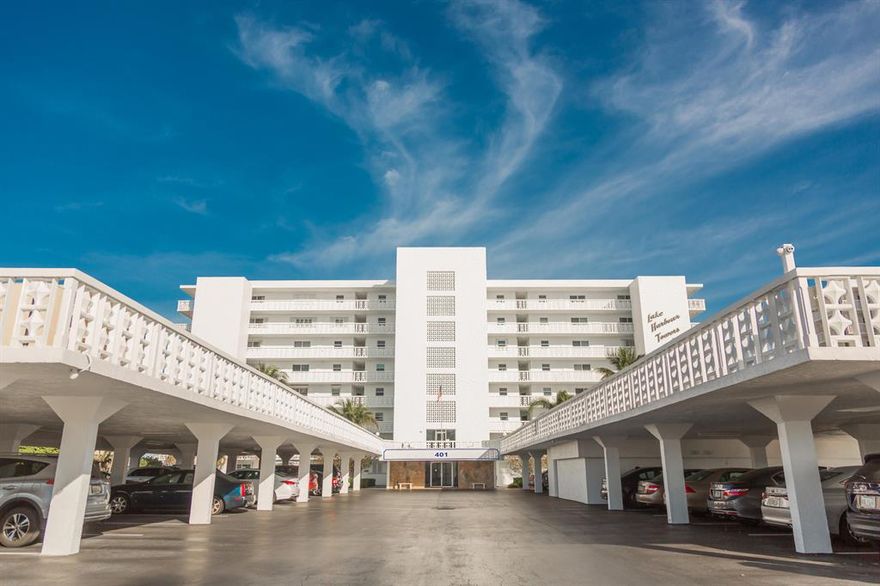 COASTAL TURNKEY FRIENDLY RESIDENCE-COMPLETELY UPDATED-PRISTINE CLEANED WITH ALL SAFE GUARDS-TASTEFULLY DECORATED TO SUIT ALL LIFESTYLES. This fabulous property is situated directly on the widest easterly intercoastal and ocean front blue water. Turnkey package includes:  sunroom with incredible expansive floor to ceiling impact windows which opens to allow the fresh Atlantic air in and watch the manatees and sea life go by, newly remodeled contemporary white kitchen with quartz counters, track lighting, single sink with SS appliances, all new bathrooms with glass shower doors, white porcelain tile and new carpet throughout,  expansive master bedroom with barn doors  to allow space into the master bathroom, large walk-in closet with storage shelves and separate dressing area,