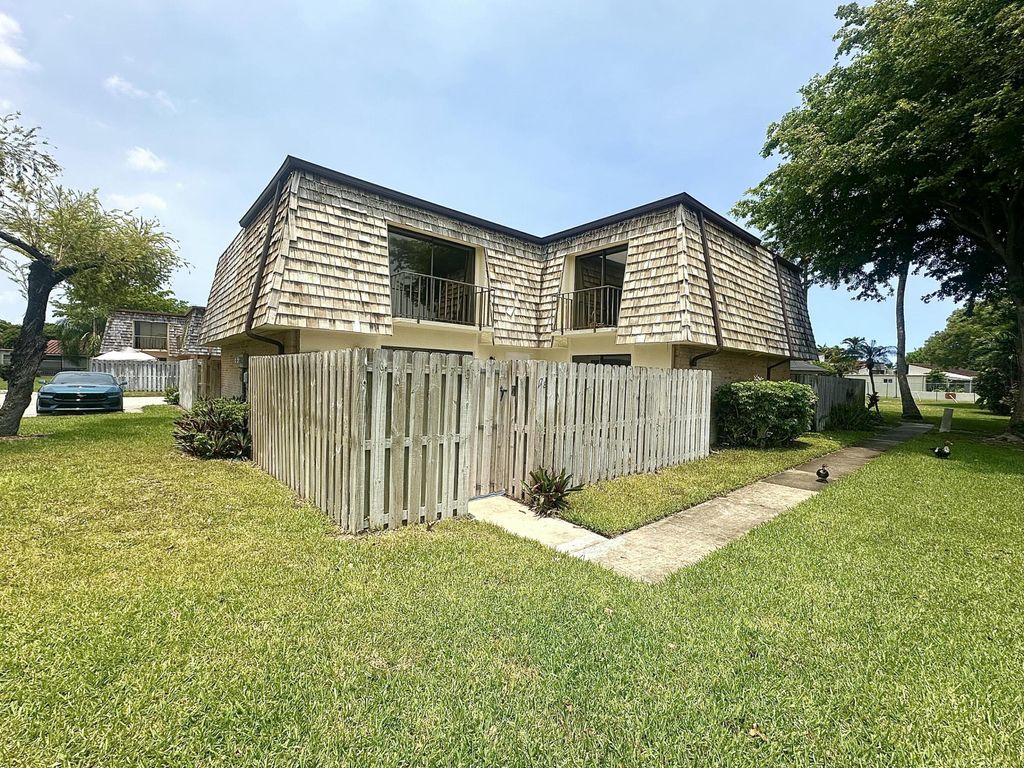 Photo of 173 Lake Arbor Drive, Palm Springs, FL 33461 (MLS # B26042515)