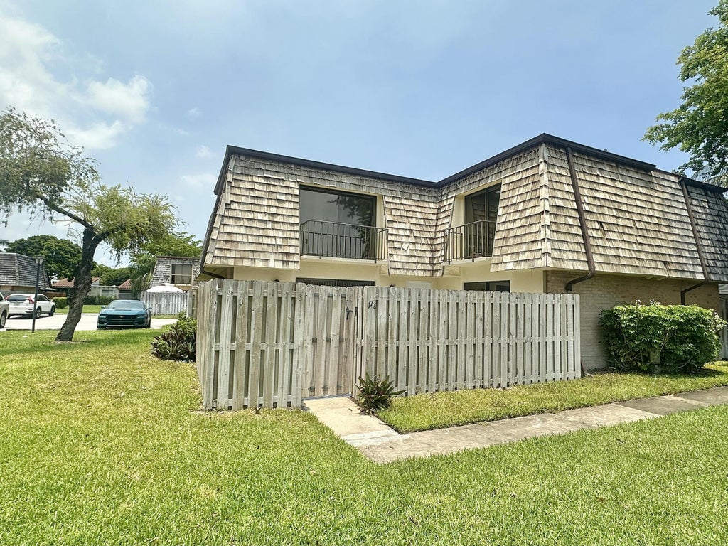 Photo of 173 Lake Arbor Drive, Palm Springs, FL 33461 (MLS # B26042515)