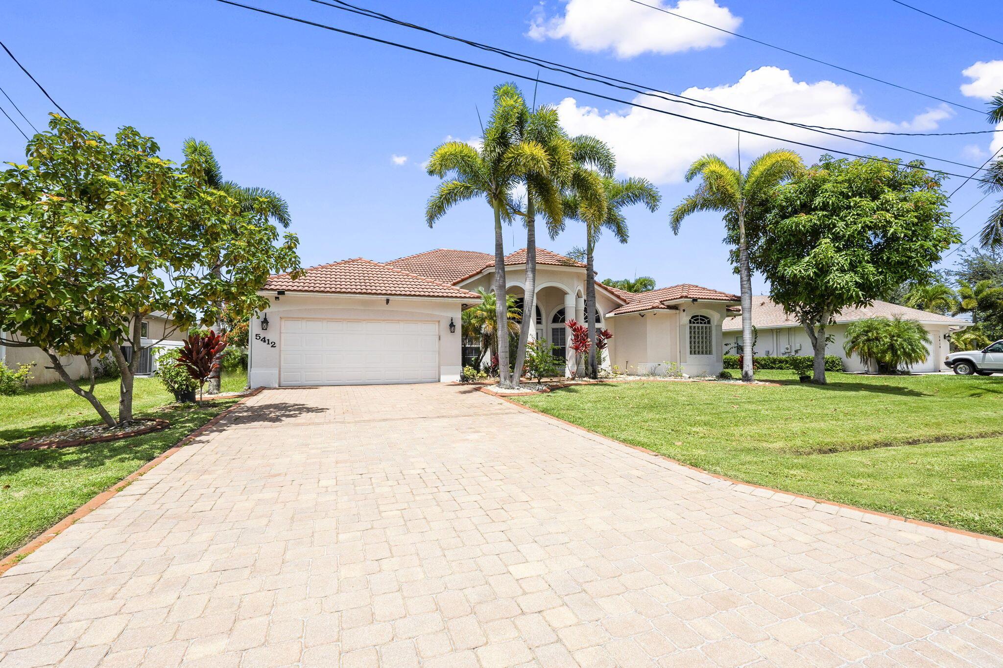 Elegant CBS Mediterranean-style home with fully paid-off solar panels for huge energy savings! Soaring ceilings, crown molding, and tile floors welcome you through double leaded-glass doors into a bright, open layout. The gourmet kitchen boasts white cabinetry, quartz countertops, stainless steel appliances, and a glass tile backsplash, overlooking the spacious family and dining areas. The oversized primary suite features tray ceilings, dual closets, and a spa-like bath. Enjoy the large screened patio and lush backyard with room for a pool. Paver driveway, 2-car garage, and abundant storage add comfort and convenience. Ideally located near shopping, dining, parks, and beaches -- blending timeless style with modern efficiency!