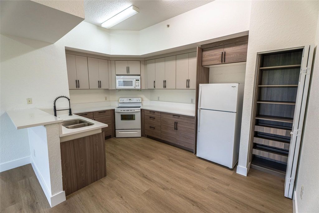 Photo of 2801 Riverside Drive #301, Coral Springs, FL 33065 (MLS # F10514126)