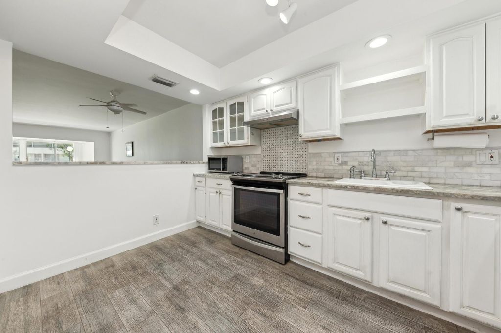 Photo of 3186 Via Poinciana #115, Lake Worth, FL 33467 (MLS # R11145722)