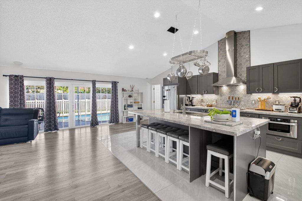 Photo of 19131 Fairlawn Way, Boca Raton, FL 33434 (MLS # B26007539)