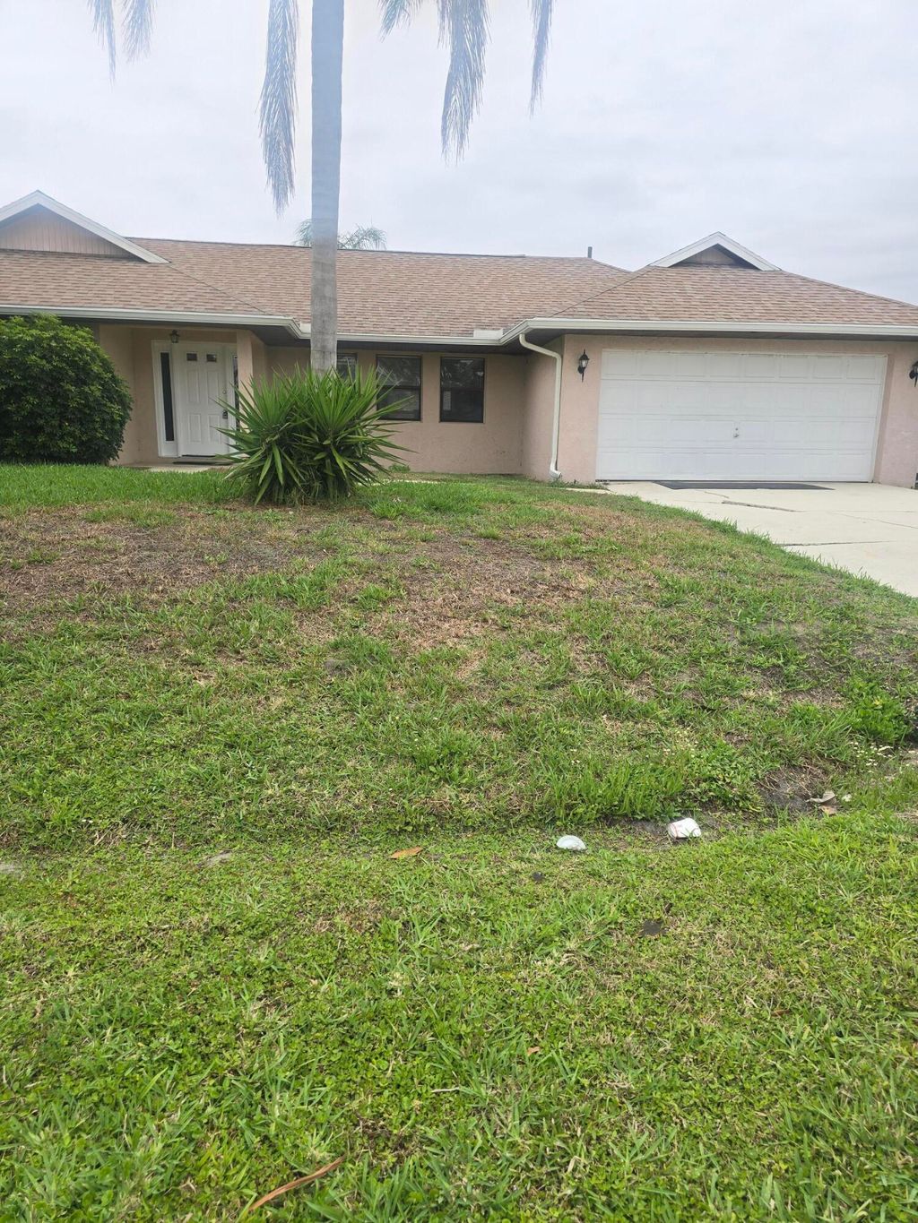 Photo of 1265 SW Medina Avenue, Port Saint Lucie, FL 34953 (MLS # B26000879)