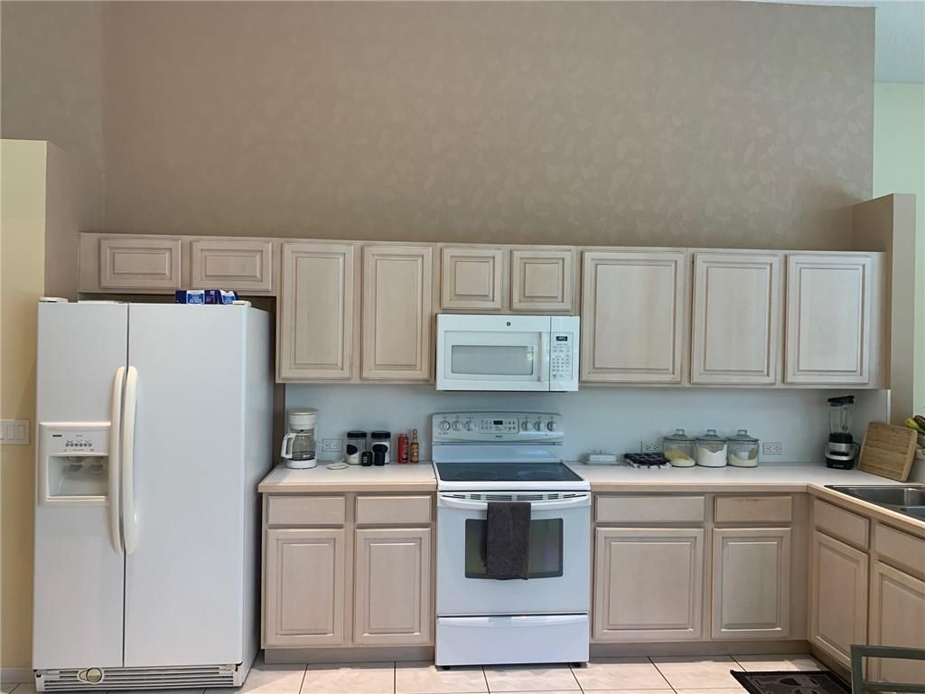 Photo of 5021 NW 107th Ave, Coral Springs, FL 33076 (MLS # F10303593)