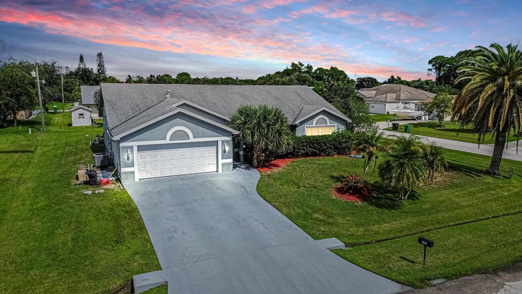 Photo of 201 SW Parish Terrace, Port Saint Lucie, FL 34984 (MLS # R11126288)