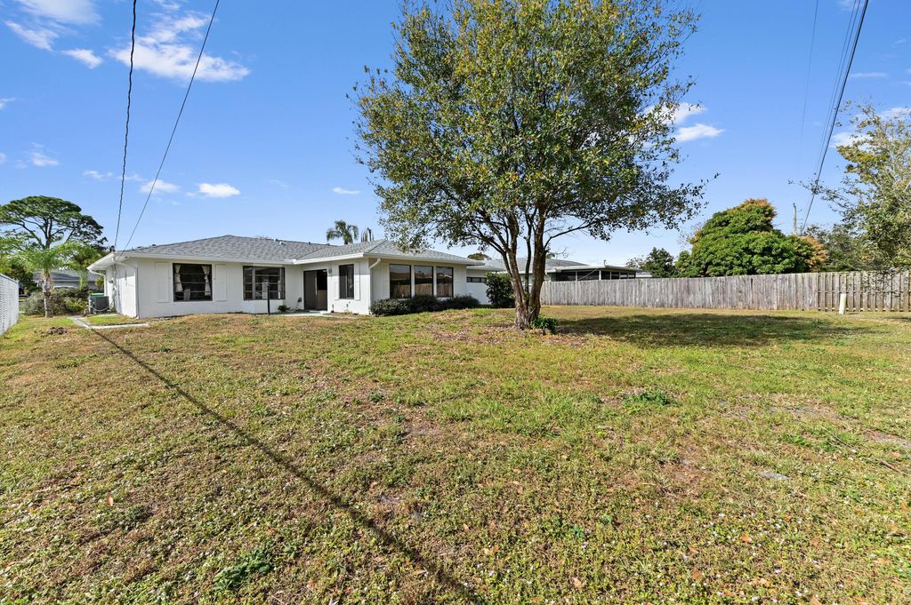 Photo of 571 SE Anchor Lane, Port Saint Lucie, FL 34983 (MLS # B26016851)