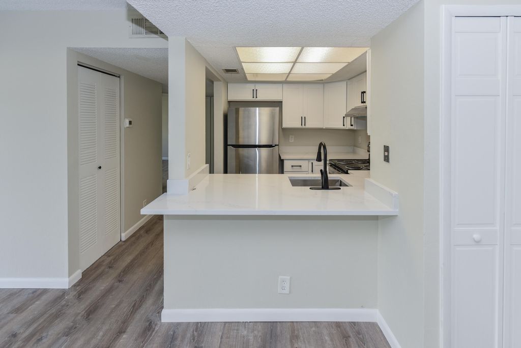 Photo of 1531 SE Royal Green Circle #202, Port Saint Lucie, FL 34952 (MLS # R11138518)