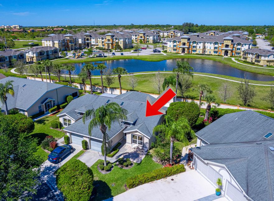 Nestled within the prestigious Garden of St. Lucie community, this exquisitely renovated 2-bedroom, 2-bath corner unit offers modern upgrades throughout. Step inside to discover soaring vaulted ceilings, Wood Floor throughout, freshly painted interior and exterior, elegant crown molding, and stylish new fixtures. The expansive open kitchen is designed for both functionality and entertaining, featuring stunning marble countertops, backsplash, custom wood cabinets, and high-end appliances. The spacious primary suite features a large walk-in closet and a fully renovated en-suite bathroom, complete with marble countertops and wood cabinetry. Additional updates include a new A/C and water heater (2024), Roof (2022), and roof over the lanai (2025). This home is further enhanced with new pavers, a welcoming front screen door, a Ring security system, and accordion shutters throughout. Enjoy the convenience of nearby shopping, parks, and the stunning Hutchinson Island beaches just 9 miles away!