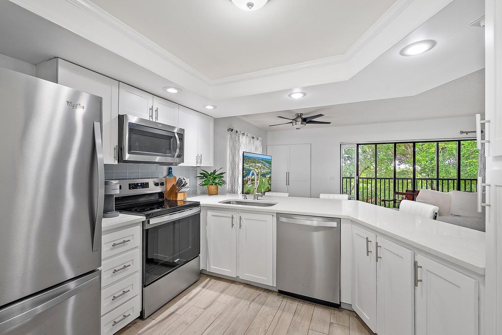 Photo of 1605 S Us Highway 1 #E401, Jupiter, FL 33477 (MLS # R11145031)