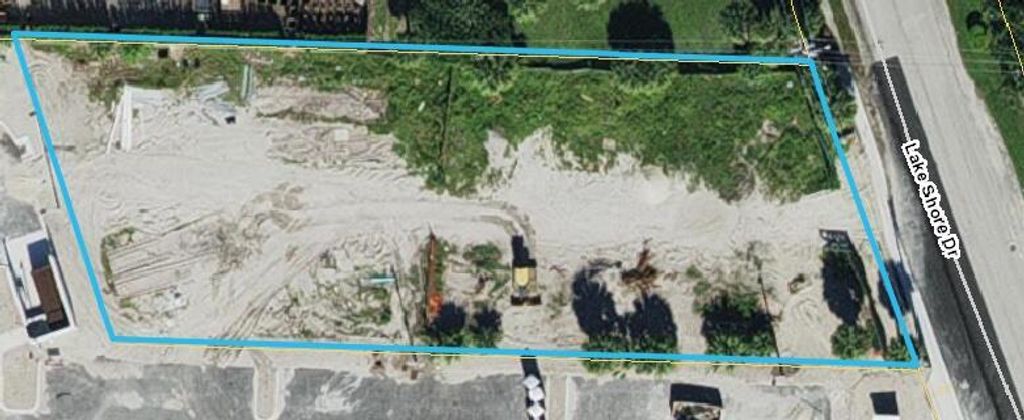 Photo of 3139 Lake Shore Drive, Riviera Beach, FL 33404 (MLS # R11146038)