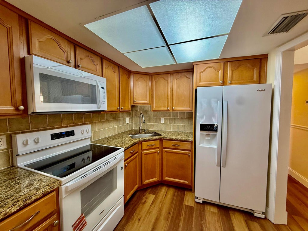 Photo of 342 Southwind Drive #122, North Palm Beach, FL 33408 (MLS # B26055217)