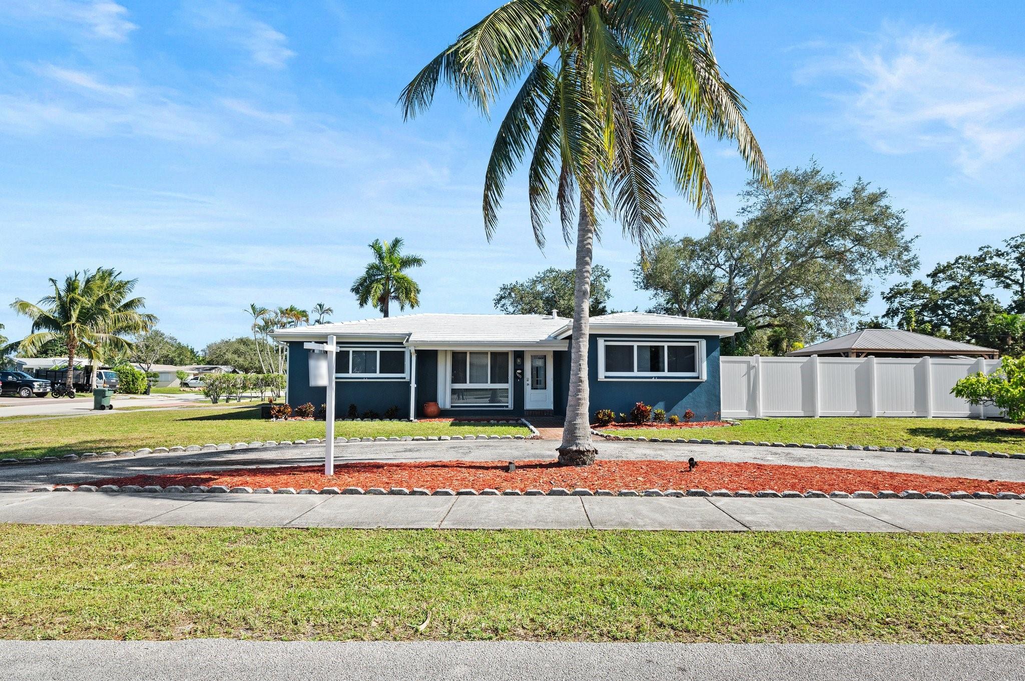 Welcome to your dream home! This beautifully maintained mid-century modern gem blends timeless style with
today’s conveniences. Fully move-in-ready, it features a lifetime roof with transferable warranty, new A/C and
ductwork, impact windows with hurricane shutters, new pool pump, water heater, ceiling fans, window treatments,
and toilets in both bathrooms. The renovated carport adds charm and function. The primary suite opens directly to a private backyard oasis with an inviting in-ground pool, perfect for relaxing or entertaining under the Florida sun.