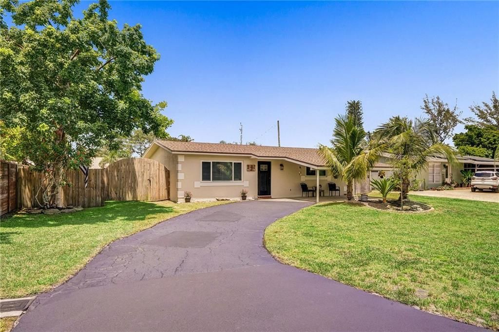 Photo of 4901 NW 76th Place, Pompano Beach, FL 33073 (MLS # F10296874)